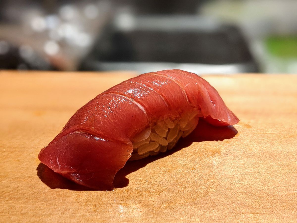 A wooden counter with toro nigiri (thinly sliced tuna stop a pat of vinegar rice) at Sushi Chitose in Redondo Beach.