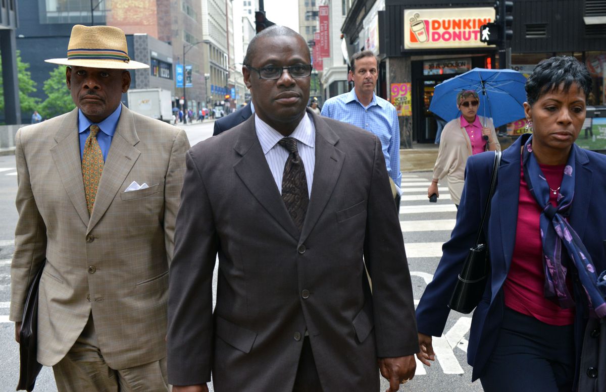 Then state Rep. Derrick Smith leaves the Dirksen Federal Building after being pronounced guilty on June 10, 2014. 