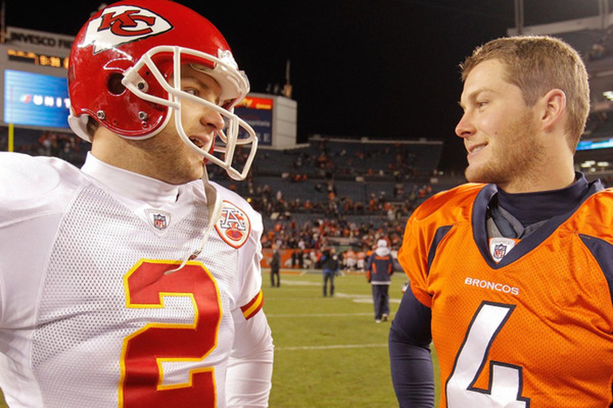 Chiefs punter Dustin Colquitt, left, talks to his brother Britton Colquitt of the Broncos.