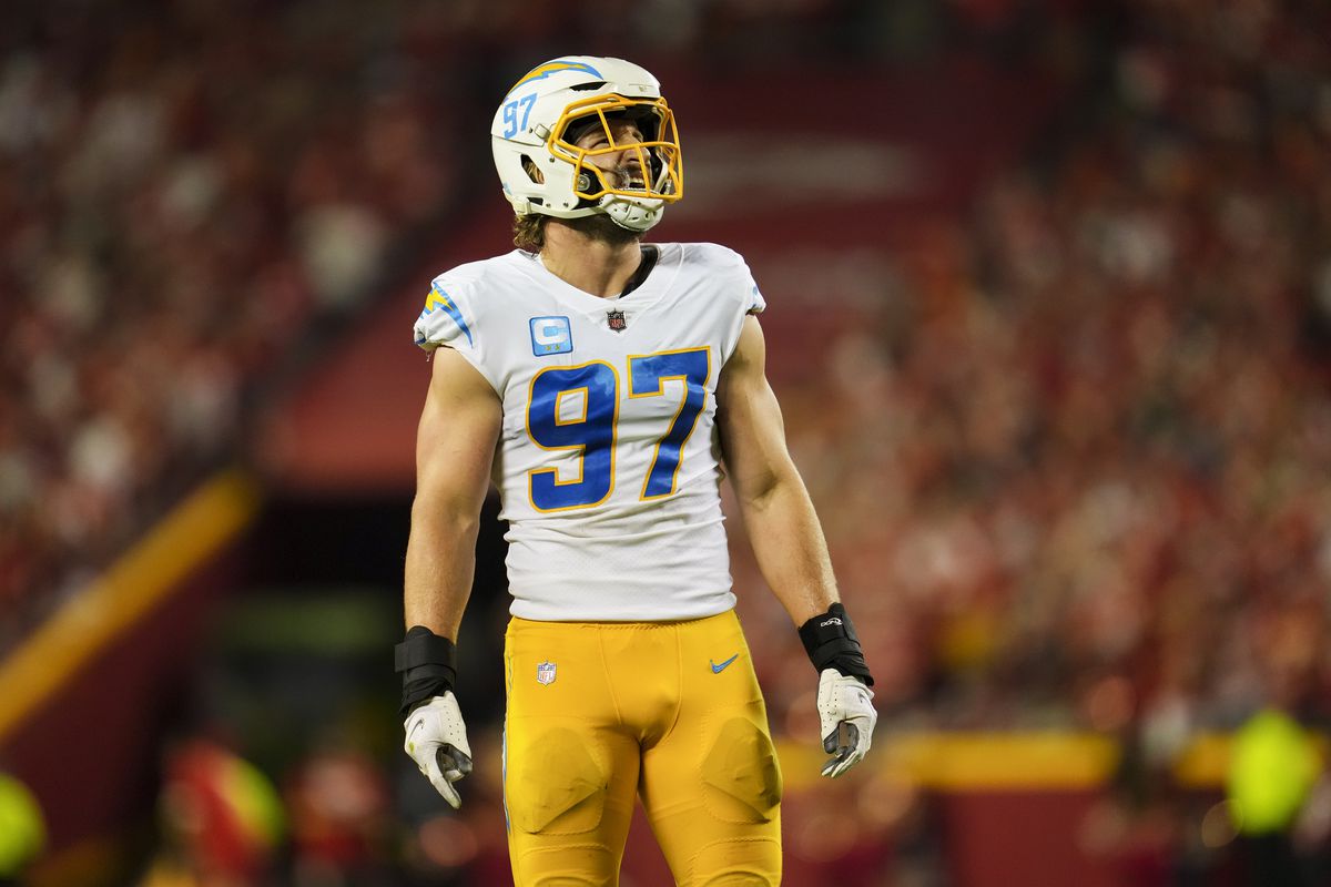 Joey Bosa #97 of the Los Angeles Chargers looks up at the scoreboard against the Kansas City Chiefs at GEHA Field at Arrowhead Stadium on September 15, 2022 in Kansas City, Missouri.