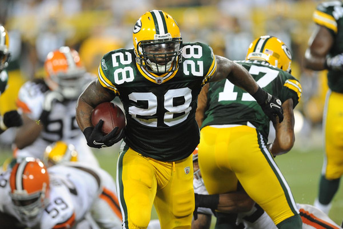 GREEN BAY WI - AUGUST 14: Kregg Lumpkin #28 of the Green Bay Packers carries the ball during the NFL preseason game against the Cleveland Browns at Lambeau Field August 14 2010 in Green Bay Wisconsin. (Photo by Tom Dahlin/Getty Images)