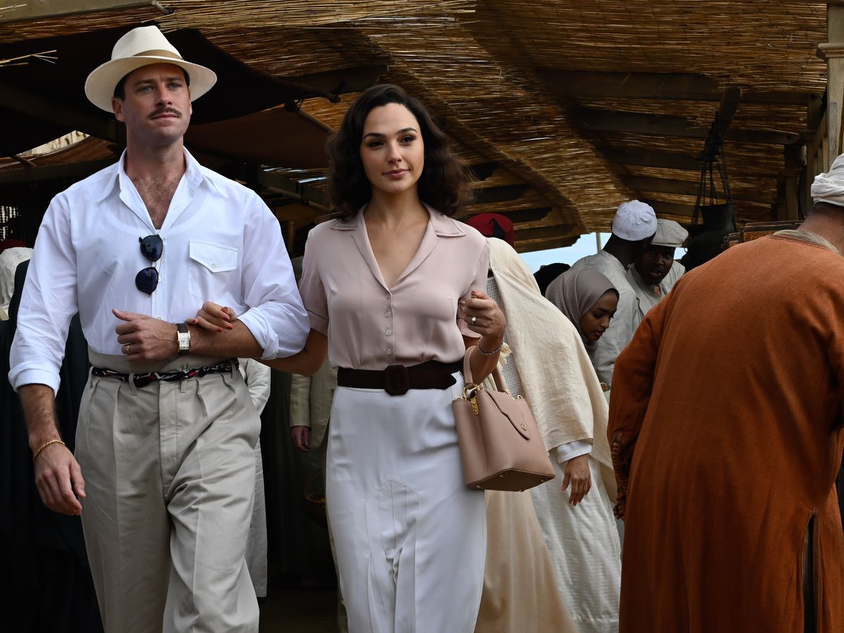 Simon Doyle and Linette Ridgeway stroll through Egypt arm in arm in Death on the Nile.
