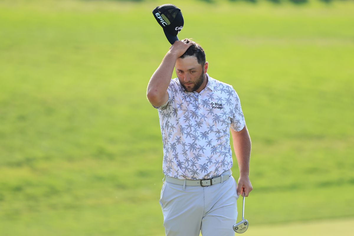 Jon Rahm of Spain reacts as he walks off the 18th green after completing his third round of The Memorial Tournament at Muirfield Village Golf Club on June 05, 2021 in Dublin, Ohio.