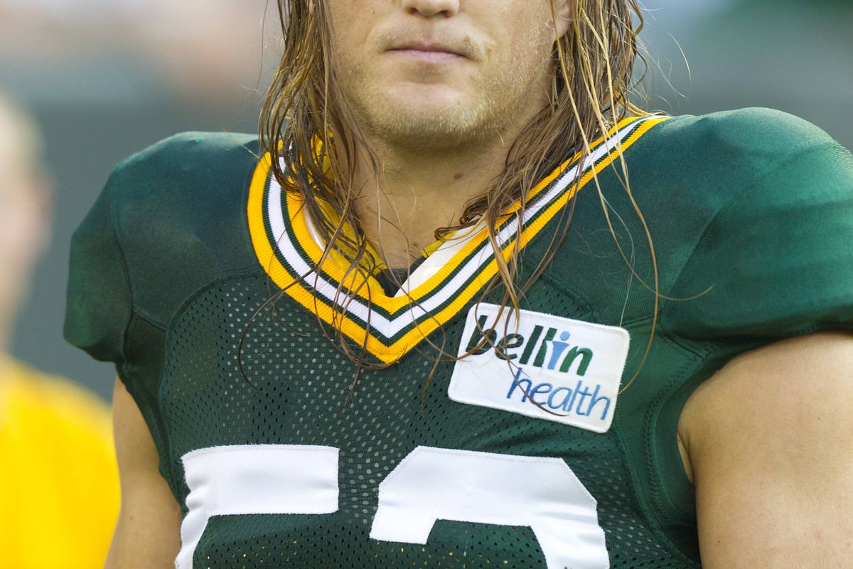 August 3, 2012; Green Bay, WI, USA; Green Bay Packers linebacker Clay Matthews (52) looks on during warmups prior to the family night scrimmage at Lambeau Field in Green Bay, WI. Mandatory Credit: Jeff Hanisch-US PRESSWIRE