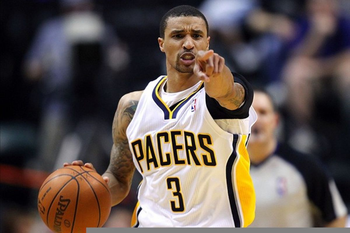 March 14, 2012; Indianapolis, IN, USA; Indiana Pacers shooting guard George Hill (3) motions to teammates against the Philadelphia 76ers at Bankers Life Fieldhouse. Indiana defeated Philadelphia 111-94. Mandatory credit: Michael Hickey-US PRESSWIRE