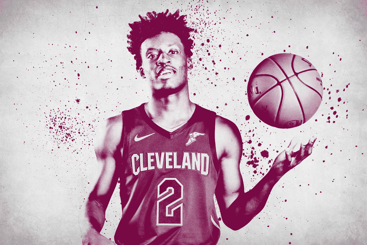 Collin Sexton with a basketball above his left hand
