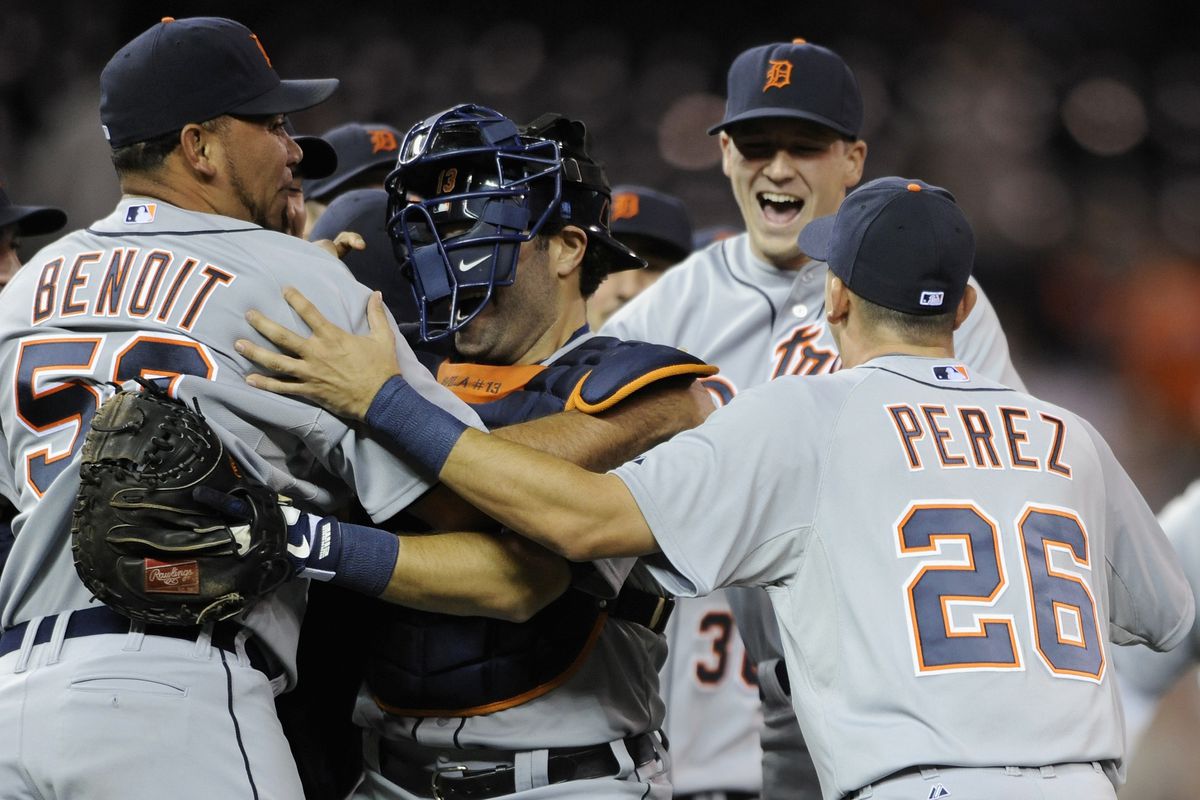 Hernan Perez and the Tigers celebrate a win against the Minnesota Twins on September 25, 2013 at Target Field