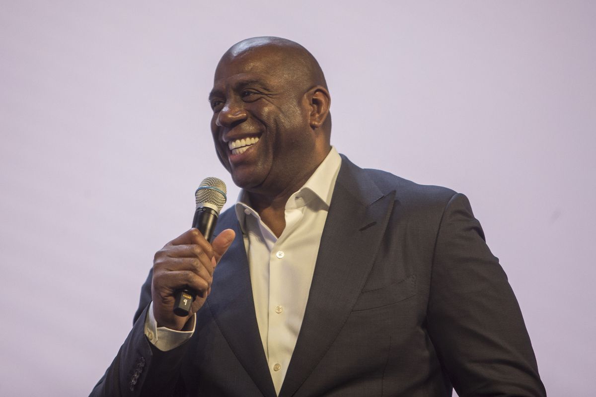 Earvin "Magic" Johnson, retired professional basketball player and President of Basketball Operations for the Lakers, speaks to the crowd during Qualtrics' X4 Summit at Salt Palace Convention Center in Salt Lake City on Thursday, March 8, 2018.