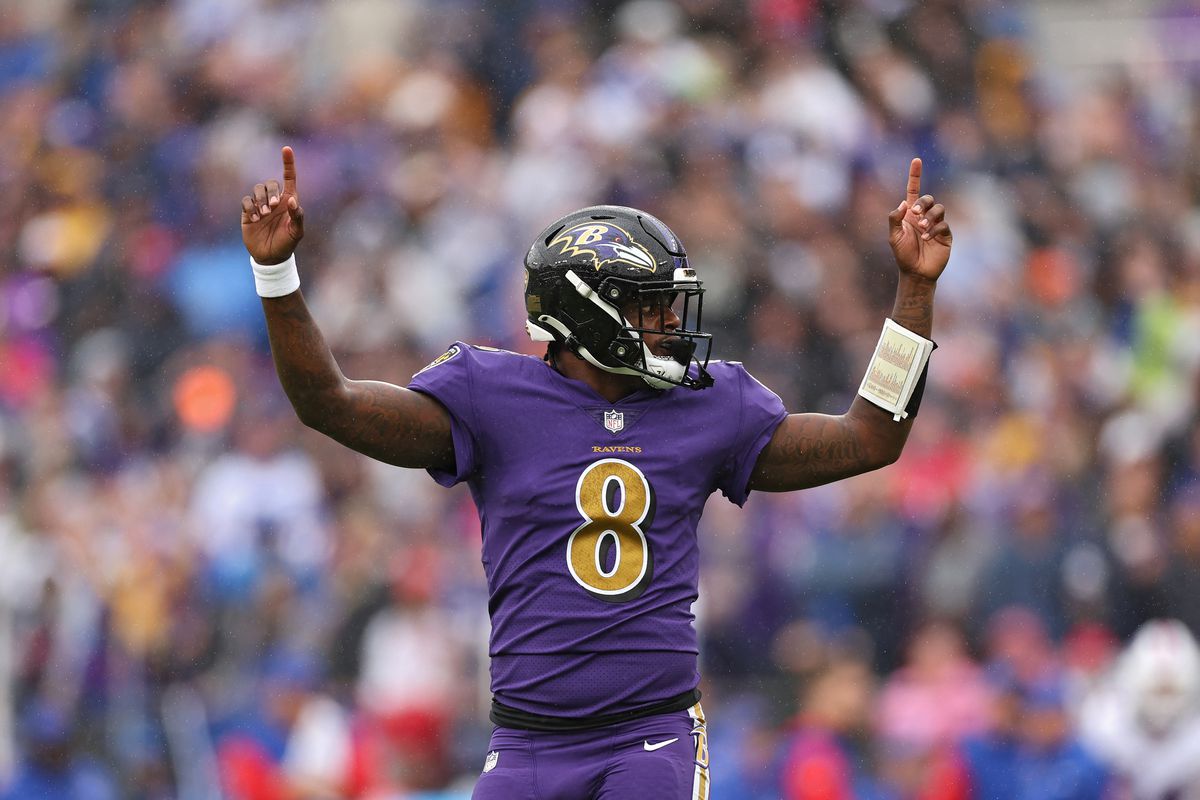 BALTIMORE, MARYLAND - OCTOBER 02: Quarterback Lamar Jackson #8 of the Baltimore Ravens celebrates after teammate J.K. Dobbins #27 (not pictured) scored a touchdown in the first quarter against the Buffalo Bills at M&amp;T Bank Stadium on October 02, 2022 in Baltimore, Maryland.