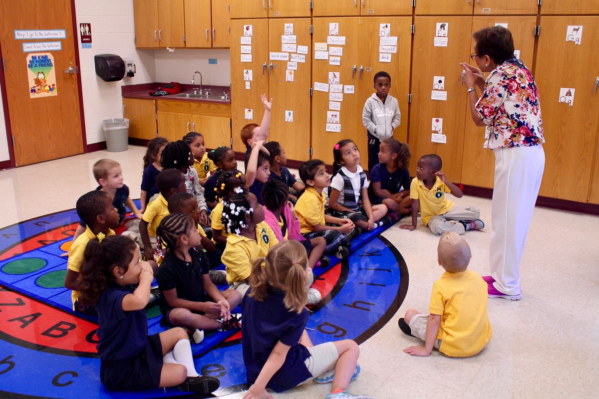 A kindergarten class at Global Prep Academy’s dual language program gather for a lesson in sorting.