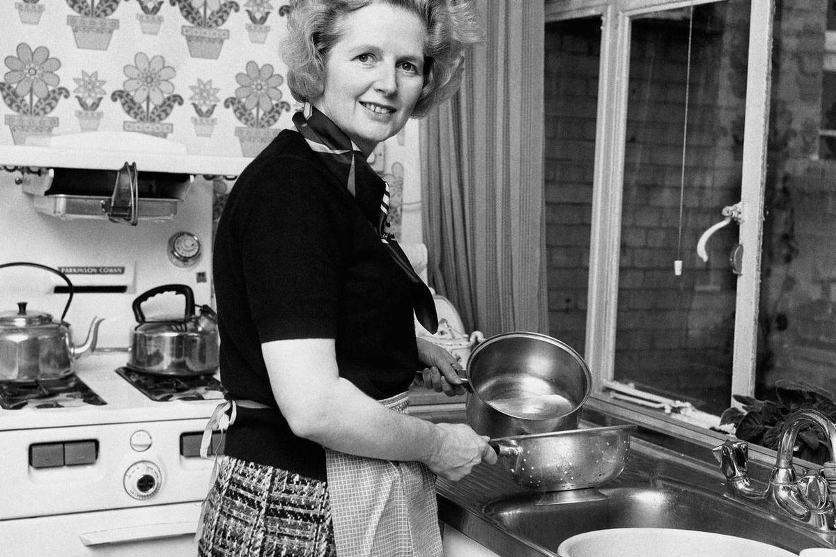Feb, 1, 1975  file photo of the them Conservative Member of Parliament  Margaret Thatcher, in her Chelsea home kitchen. She was Britain's first female leader, a strong woman who battled her way to the top of a male-dominated political system, but don't ca