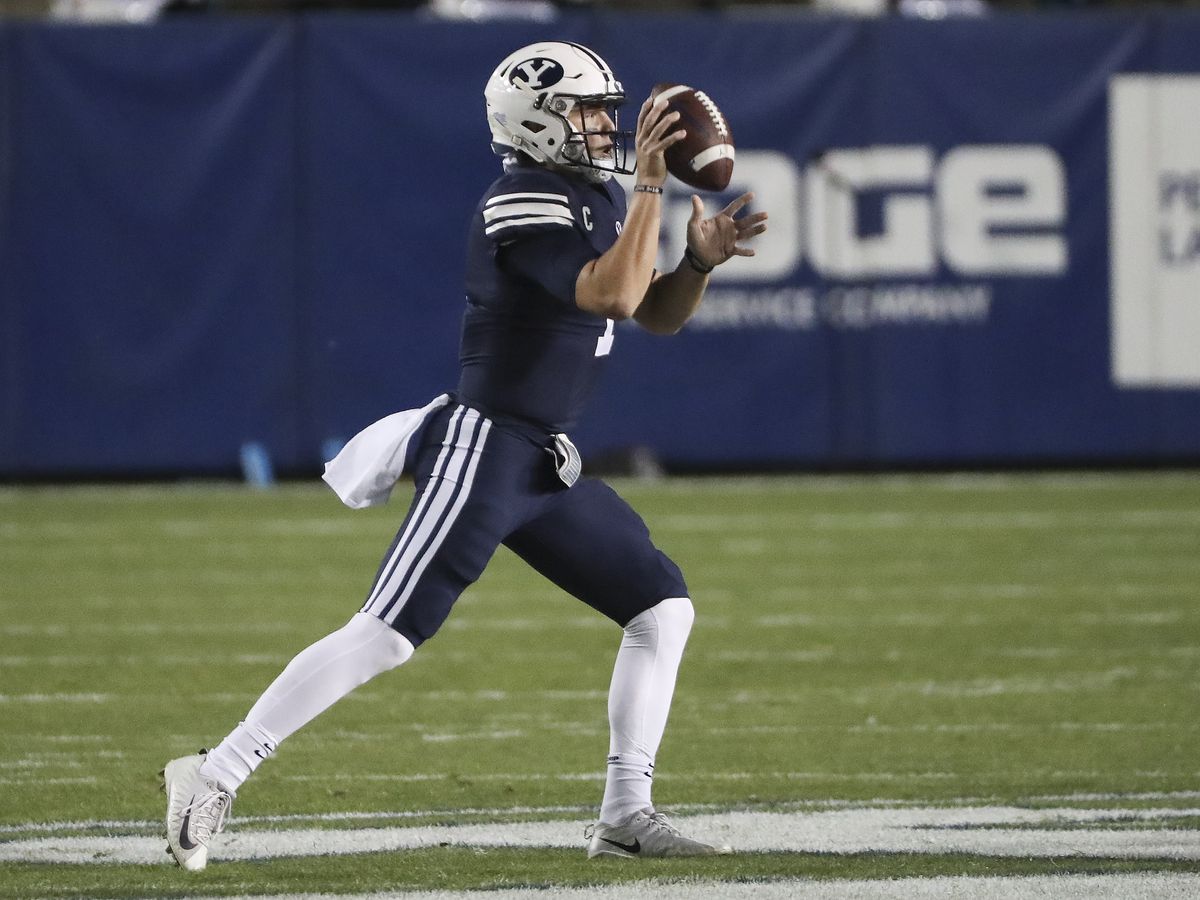 Brigham Young Cougars quarterback Zach Wilson (1) lobs the ball in Provo on Saturday, Oct. 24, 2020.