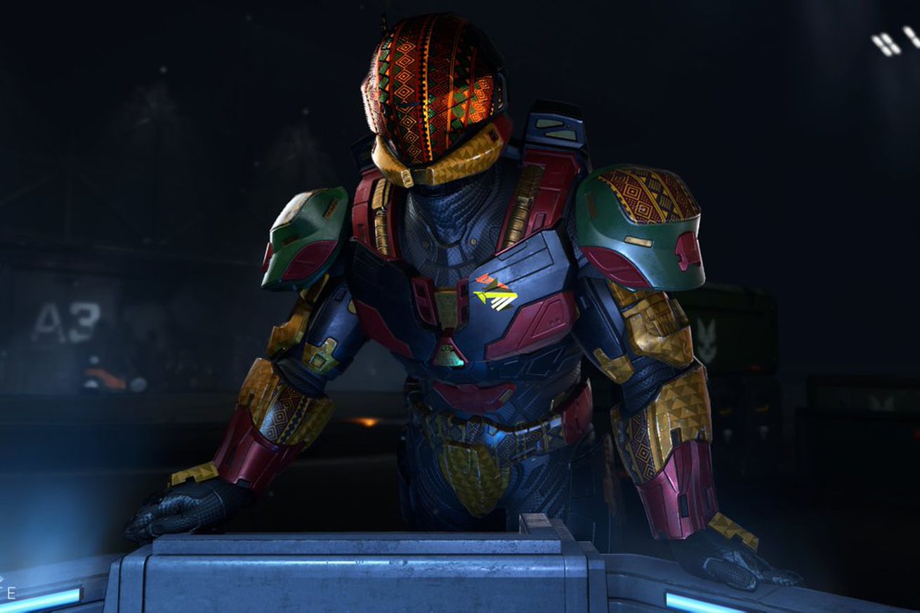 Image from Halo: Infinite featuring a Spartan wearing armor customized with African themed armor shaders.
