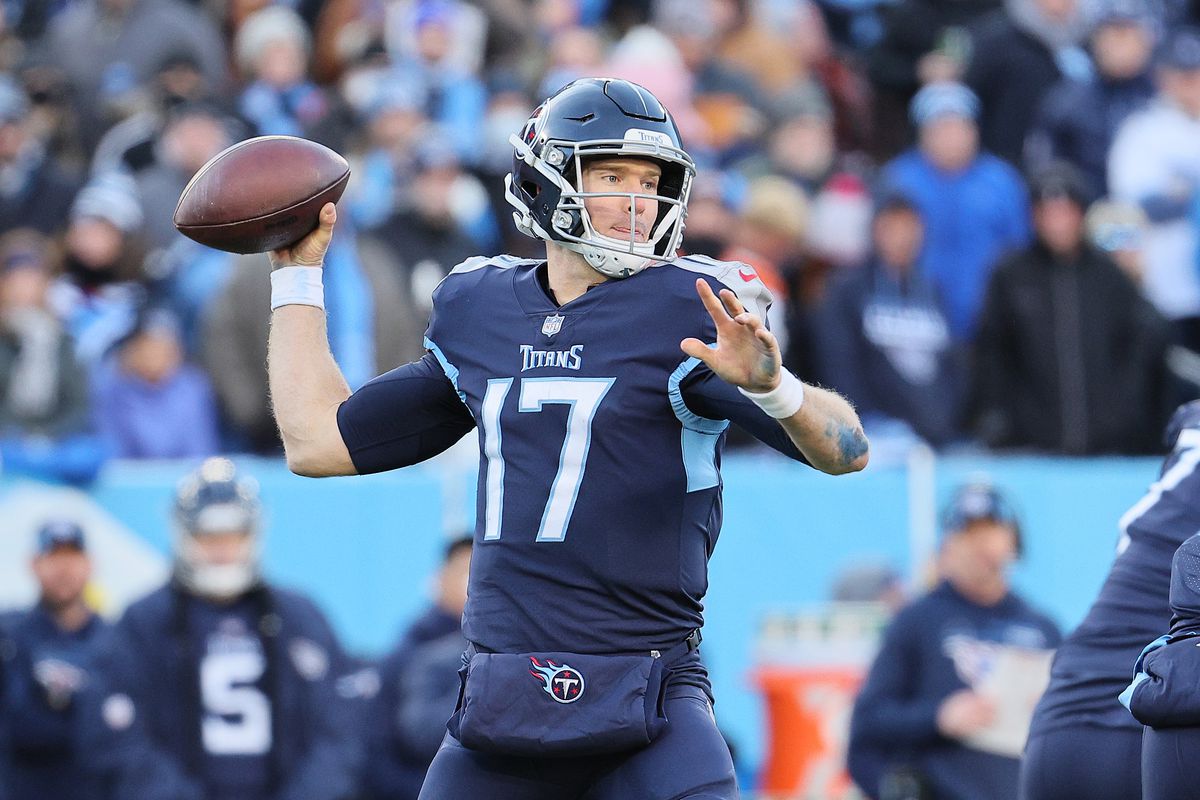 Ryan Tannehill #17 of the Tennessee Titans runs against the Cincinnati Bengals during the AFC Divisional Playoff at Nissan Stadium on January 22, 2022 in Nashville, Tennessee.
