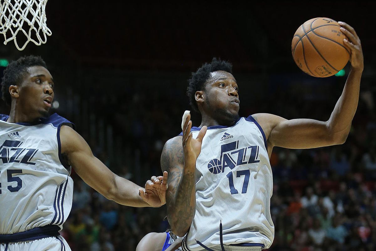 Utah Jazz guard Donovan Mitchell (45) and Utah Jazz forward Eric Griffin (17) look for a rebound as the Utah Jazz and the Philadelphia 76ers play in Summer league action in the Huntsman Center at the University of Utah in Salt Lake City on Wednesday, July