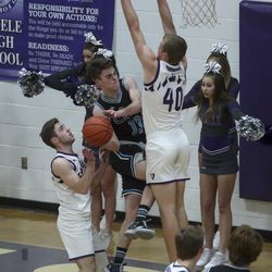 Action in the first round of the boys 4A basketball tournament between Canyon View and Tooele at Tooele High School on Tuesday, Feb. 23, 2021.