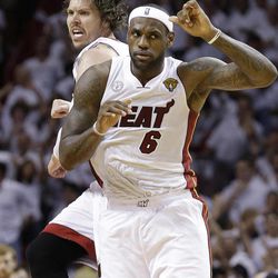 Miami Heat shooting guard Mike Miller (13) and LeBron James celebrate during the second half of Game 2 of the NBA Finals basketball game against the San Antonio Spurs, Sunday, June 9, 2013 in Miami. 
