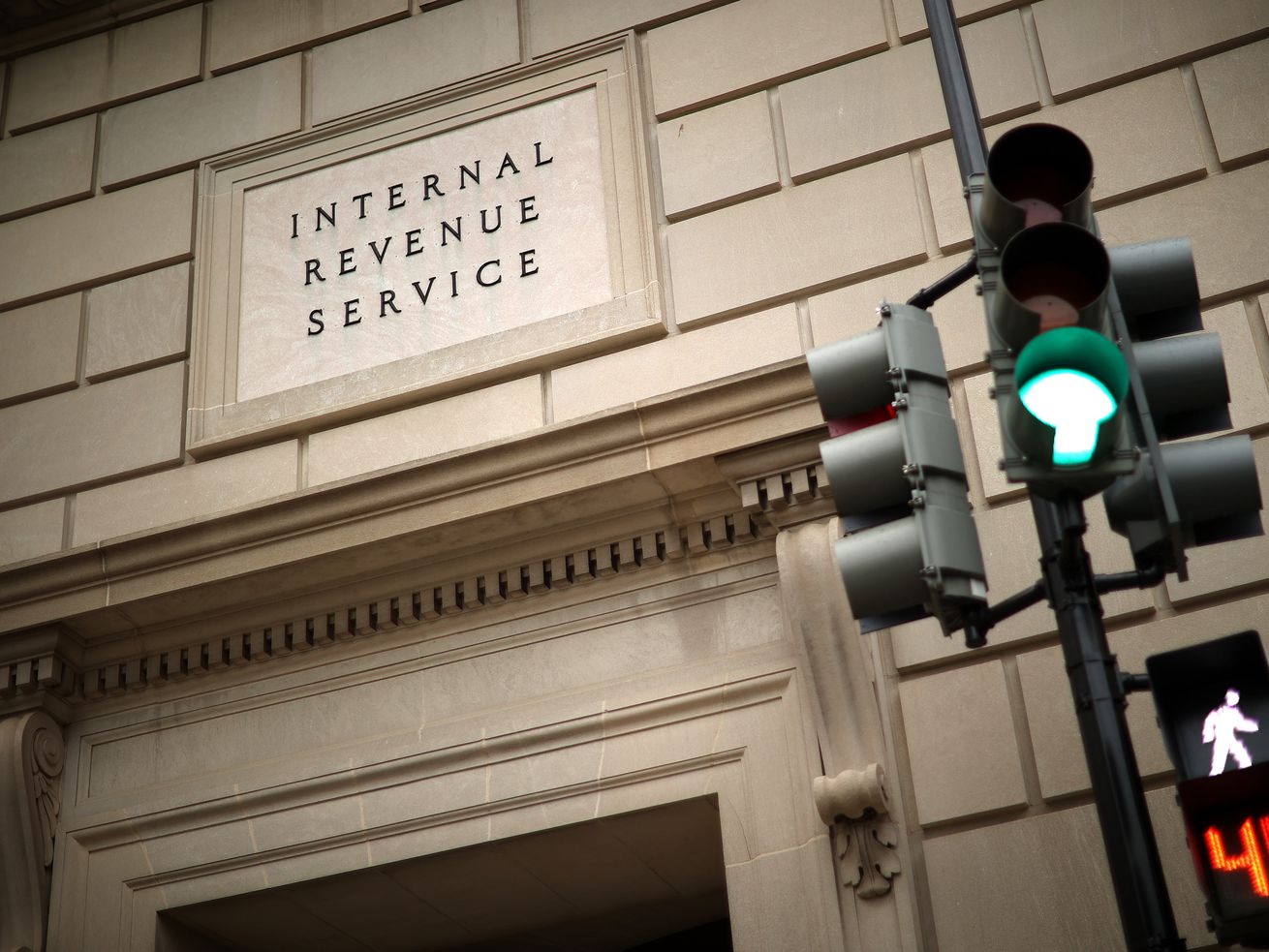 A sign reading “Internal Revenue Service” outside a building.
