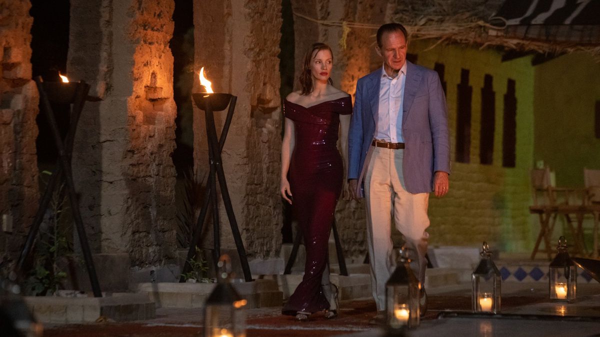 David (Ralph Fiennes) and Jo (Jessica Chastain) walk alongside one another in a gorgeous Moroccan house in The Forgiven.