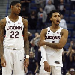 UConn's Terry Larrier (22) and Jalen Adams (4) react after a missed free throw during the Monmouth Hawks vs UConn Huskies men's college basketball game at the XL Center in Hartford, CT on December 2, 2017.