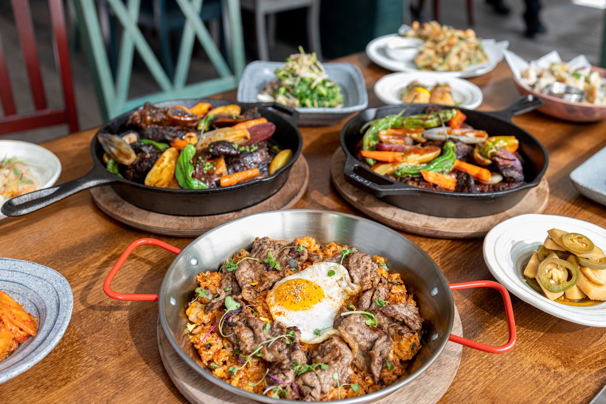 The chadol baegi kimchi fried rice surrounded by other dishes