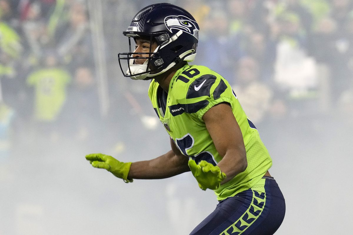 Tyler Lockett #16 of the Seattle Seahawks takes the field prior to a game against the San Francisco 49ers at Lumen Field on December 15, 2022 in Seattle, Washington.