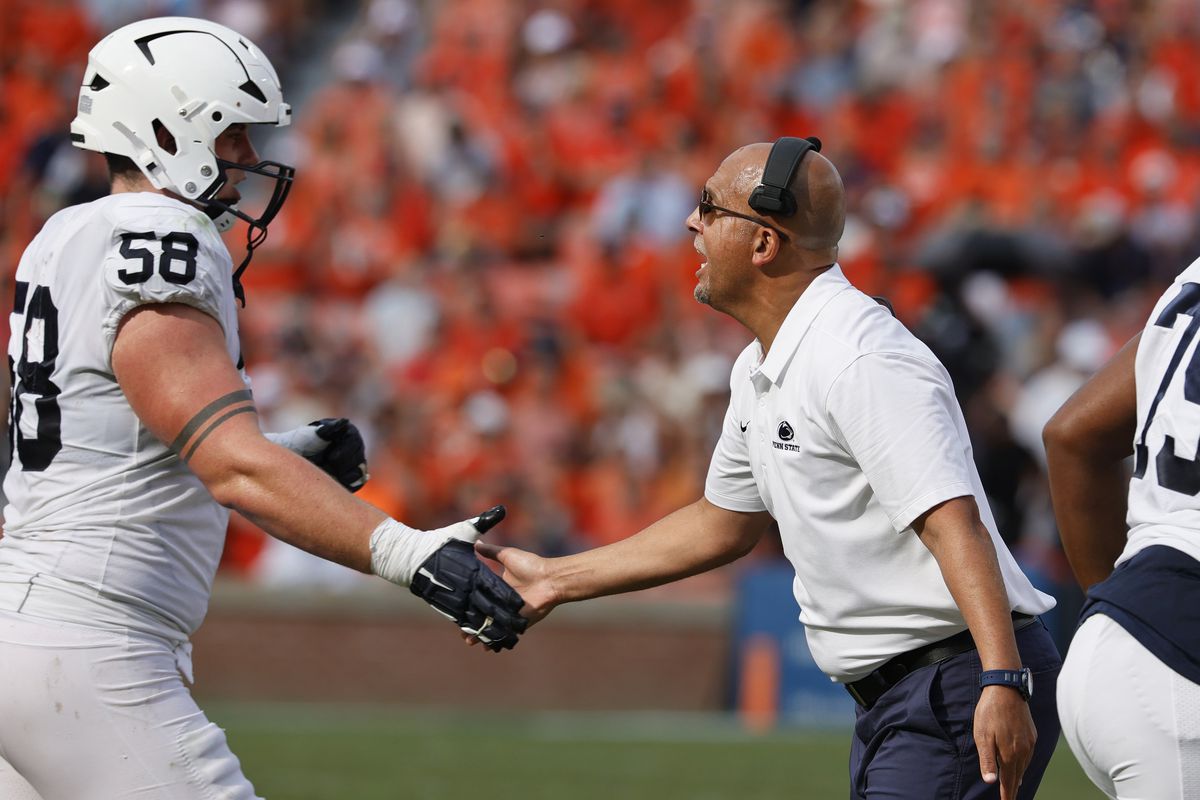 Sep 17, 2022; Auburn, Alabama, USA; Penn State Nittany Lions head coach James Franklin celebrates with offensive lineman Landon Tengwall (58) after a touchdown during the second quarter against the Auburn Tigers at Jordan-Hare Stadium.&nbsp;