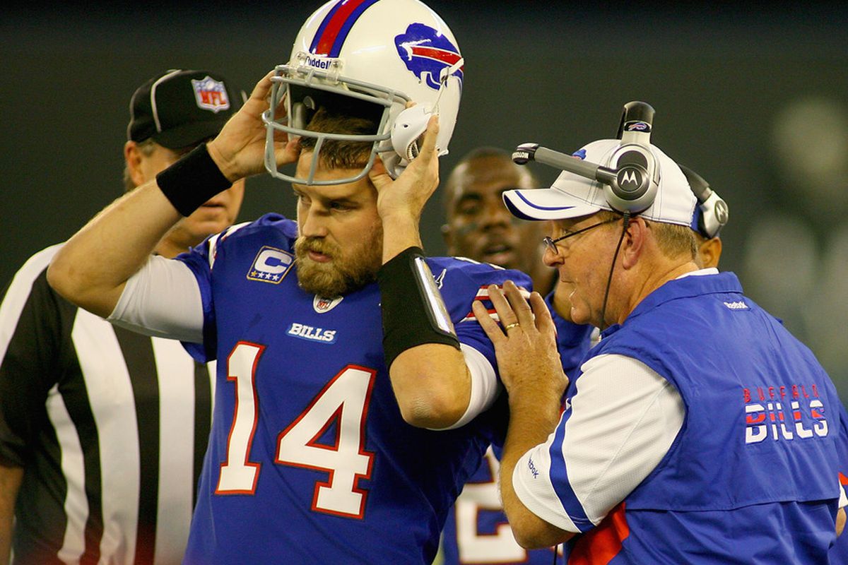TORONTO, ON - OCTOBER 30:  Ryan Fitzpatrick #14 of the Buffalo Bills listens to head coach Chan Gailey during a time out against the Washington Redskins at Rogers Centre on October 30, 2011 in Toronto, Ontario.  (Photo by Rick Stewart/Getty Images)