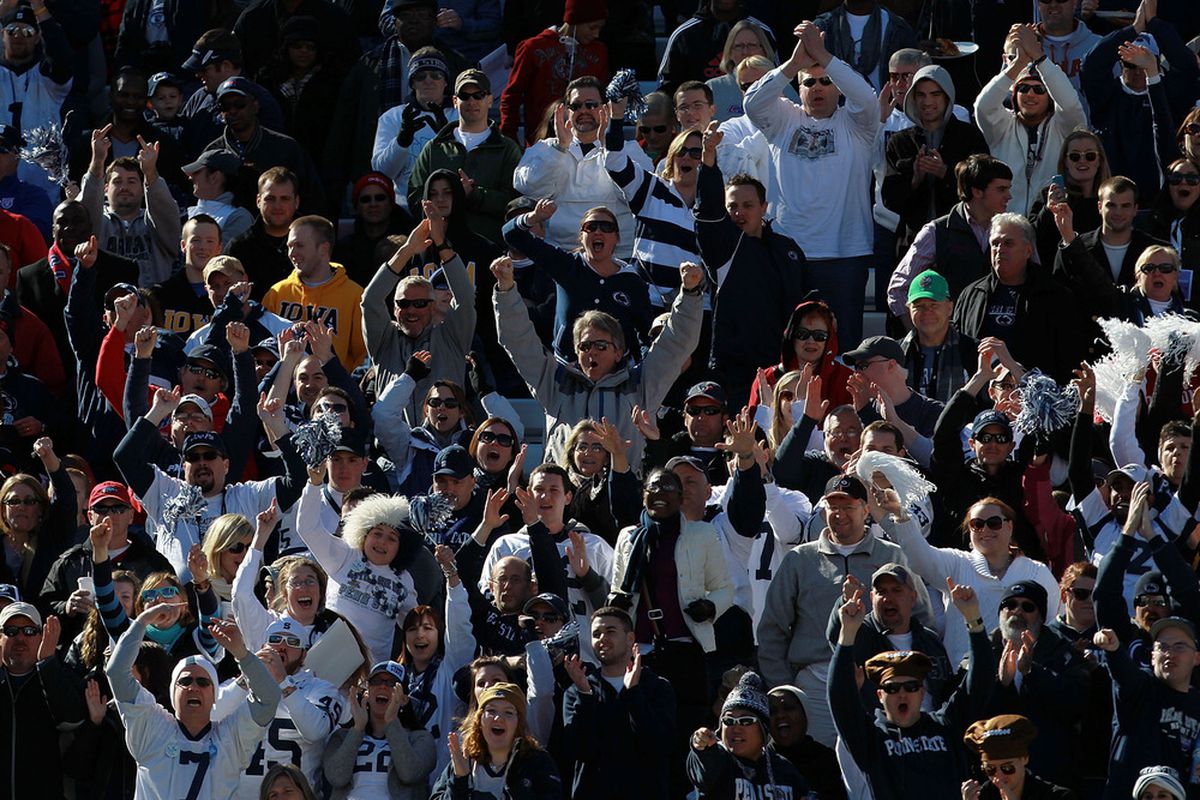 DALLAS, TX - JANUARY 02:  Penn State Nittany Lions fans cheer during the TicketCity Bowl at Cotton Bowl Stadium on January 2, 2012 in Dallas, Texas.  (Photo by Ronald Martinez/Getty Images)