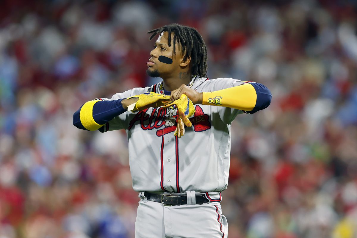 Ronald Acuna Jr. of the Atlanta Braves reacts after flying out in the seventh inning against the Philadelphia Phillies during Game Four of the Division Series at Citizens Bank Park on October 12, 2023 in Philadelphia, Pennsylvania.