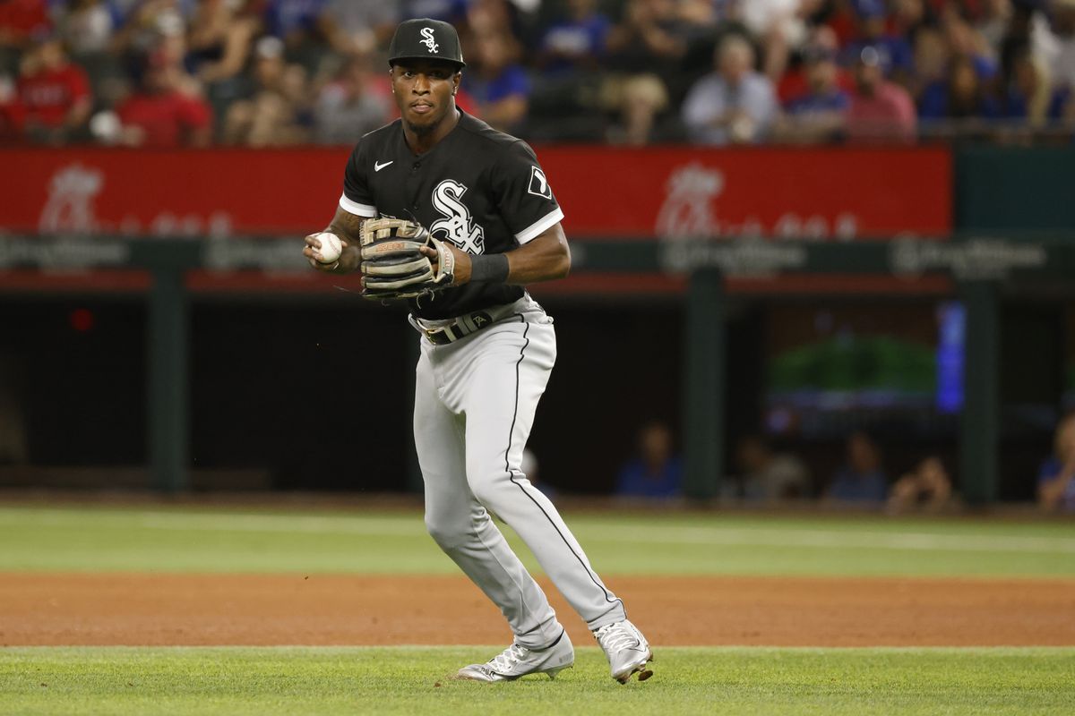 Tim Anderson #7 of the Chicago White Sox looks to throw the ball against the Texas Rangers at Globe Life Field on August 4, 2022 in Arlington, Texas.