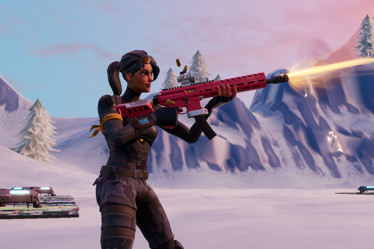 female Fornite character firing the Tactical Assault Rifle in the snow