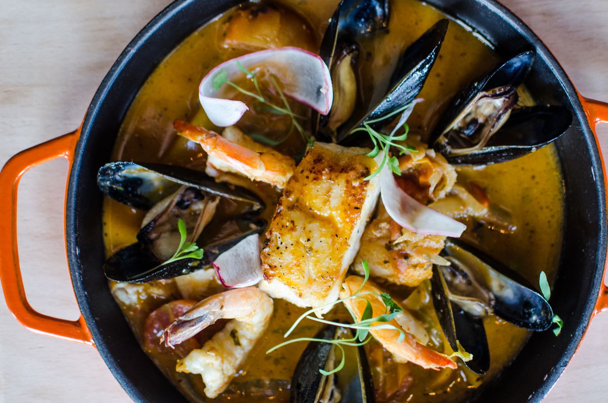Casa Caña’s enchilado de pescado: shrimp, mussel, and fish stew with tomatoes, cilantro, coconut, and citrus broth