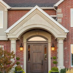 After: Upgrading the front door can enhance curb appeal and energy efficiency.