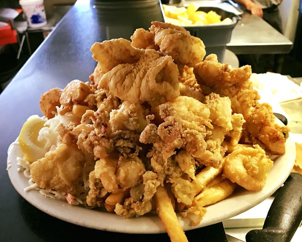 Plate of fried seafood and fries