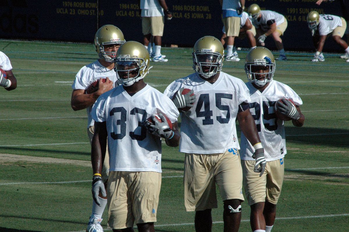 Coleman (33), Umodu (45), Thigpen (25) looking to keep our offense moving. Photo Credit: E. Corpuz