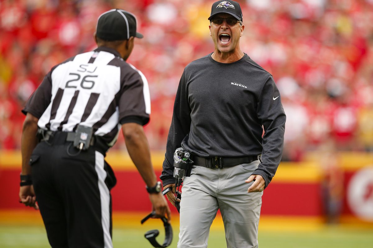 Head coach John Harbaugh of the Baltimore Ravens shouts at side judge Jabir Walker after a personal foul penalty on the Ravens during the game against the Kansas City Chiefs at Arrowhead Stadium on September 22, 2019 in Kansas City, Missouri.