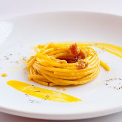 Bucatini alla Carbonara from Bevacco by <a href="http://www.flickr.com/photos/erpomata/6516651347/in/pool-eater/">erpomata73</a>.<br />