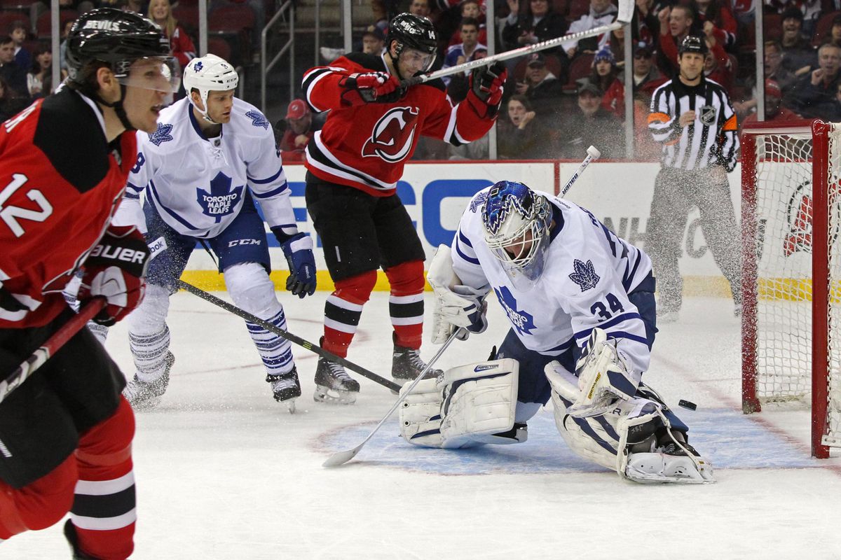 Pictured: Damien Brunner contributing to the Devils' cause by scoring a goal.