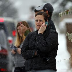 Shelly Craven, who has a son at Mueller Park Junior High School, waits in Bountiful on Thursday, Dec. 1, 2016, to learn what is happening as officials respond to a shooting incident at the school. No injuries were reported and one student was taken into custody.