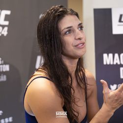 Mackenzie Dern talks to the press at UFC 224 media day Thursday in Rio de Janeiro.