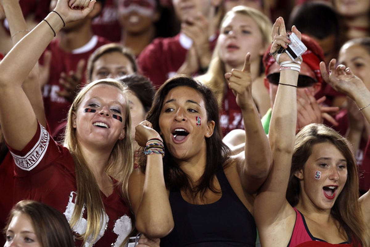 PALO ALTO CA - SEPTEMBER 18:  Stanford Cardinal fans cheer for their team as they warm up before their game against the Wake Forest Demon Deacons at Stanford Stadium on September 18 2010 in Palo Alto California.  (Photo by Ezra Shaw/Getty Images)