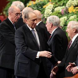 President Thomas S. Monson leaves the afternoon session of the 183rd Annual General Conference of The Church of Jesus Christ of Latter-day Saints in the Conference Center in Salt Lake City on Sunday, April 7, 2013. Behind him are First Counselor Henry B. Eyring and Second Counselor Dieter F. Uchtdorf, left.