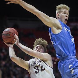 Lone Peak's Taylor Madson puts up a shot while being guarded by Layton's Skyler Turner during the Lone Peak Knights' 82-47 victory against the Layton Lancers in the Class 6A state semifinals at the Jon M. Huntsman Center in Salt Lake City on Friday, March 2, 2018.
