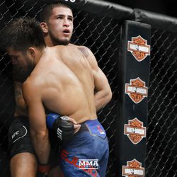 Sergio Pettis looks up at the clock at UFC 218.