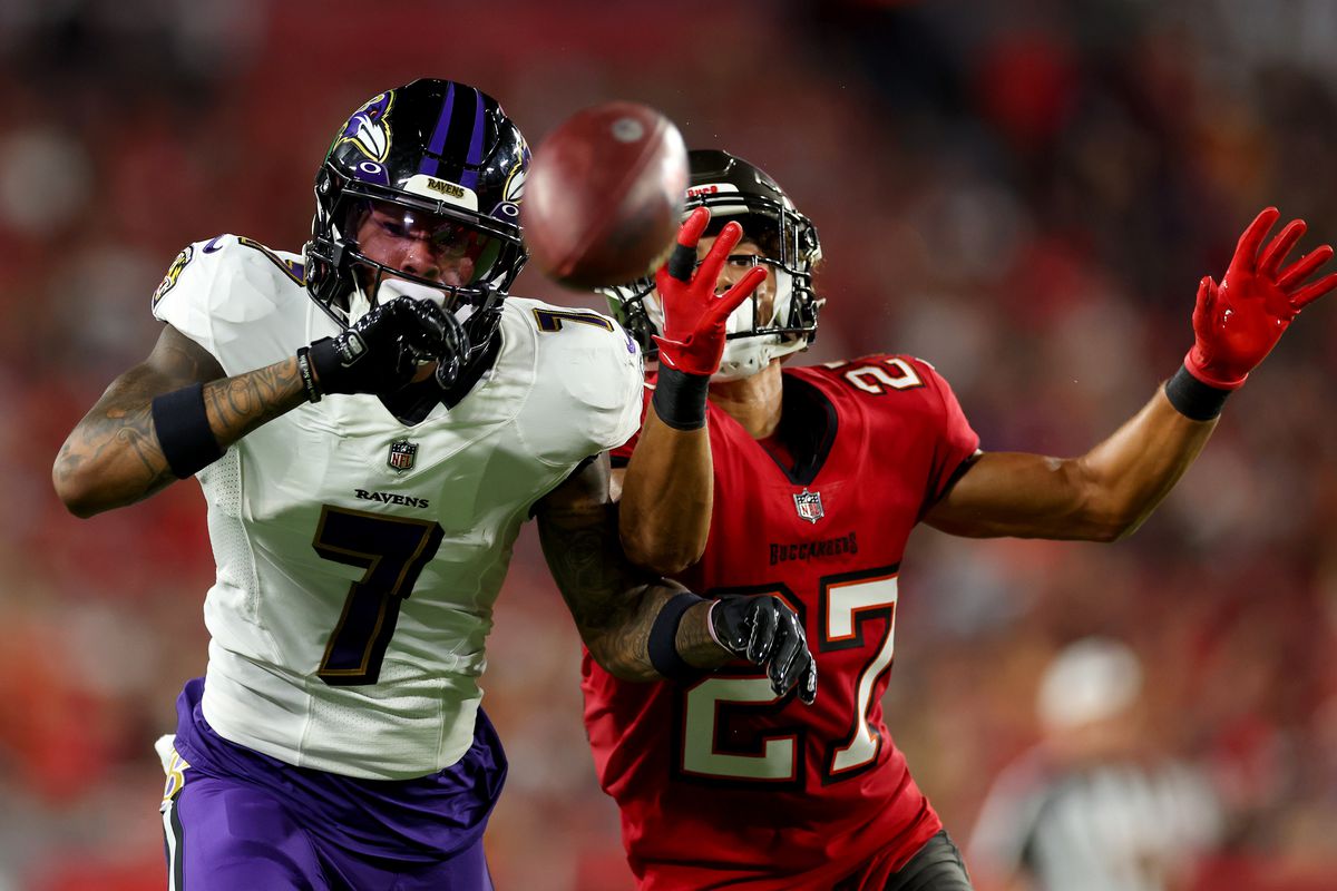 Rashod Bateman #7 of the Baltimore Ravens and Zyon McCollum #27 of the Tampa Bay Buccaneers compete for a ball during the second quarter at Raymond James Stadium on October 27, 2022 in Tampa, Florida.
