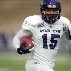Braden Corpus runs with the ball during Weber State's Purple and White game at Stewart Stadium in Ogden on Saturday, April 13, 2013.