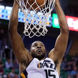 Utah Jazz forward Derrick Favors (15) dunks the ball during NBA basketball against Memphis in Salt Lake City on Monday, Nov. 14, 2016.