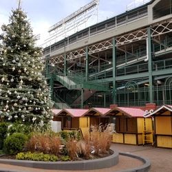Christmas tree and Christkindlmarket setup at Park at Wrigley