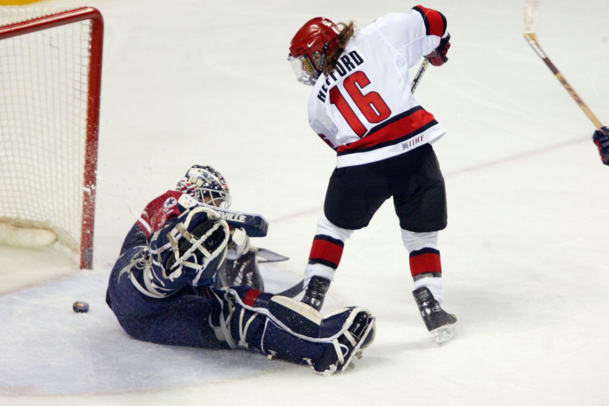 Jayna Hefford #16 scores the game winning goal at the 2002 Olympic Games in Salt Lake City to win Canada its first gold medal in women’s hockey.